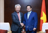Vietnamese PM Pham Minh Chinh works with leaders of leading Chinese groups in Tianjin